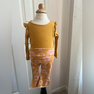 Yellow Knit Baby Onesie and floral bell bottoms